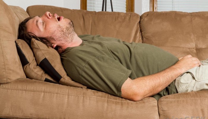 man-sleeping-on-couch-with-mouth-open